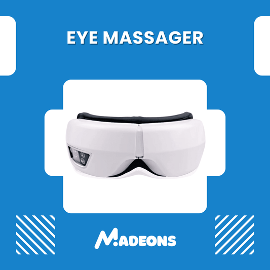 White eye massager with black straps on a blue background, featuring the brand 'MADEONS'.